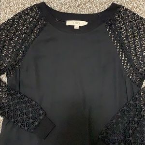 Black loft top with sheer sleeve detailing